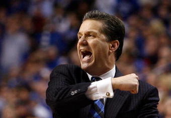LEXINGTON, KY - JANUARY 02:  John Calipari the Head Coach of the Kentucky Wildcats gives instructions to his team during the game against the Louisville Cardinals at Rupp Arena on January 2, 2010 in Lexington, Kentucky.  (Photo by Andy Lyons/Getty Images)