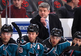 GLENDALE, AZ - DECEMBER 12:  Head coach Todd McLellan of the San Jose Sharks watches from the bench during the NHL game against the Phoenix Coyotes at Jobing.com Arena on December 12, 2009 in Glendale, Arizona. The Coyotes defeated the Sharks 2-1. (Photo by Christian Petersen/Getty Images)