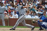 CHICAGO - JULY 03:  J.J. Hardy #7 of the Milwaukee Brewers at bat against the Chicago Cubs during their MLB game on July 3, 2009 at Wrigley Field in Chicago, Illinois. (Photo by Jonathan Daniel/Getty Images) 
