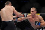 DALLAS - SEPTEMBER 19:  UFC fighter Junior Dos Santos (R) battles UFC fighter Mirko Cro Cop (L) during their Heavyweight bout at UFC 103: Franklin vs. Belfort at the American Airlines Center on September 19, 2009 in Dallas, Texas.  (Photo by Jon Kopaloff/Getty Images)