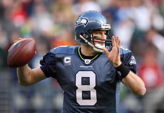 SEATTLE - DECEMBER 6:  Quarterback Matt Hasselbeck #8 of the Seattle Seahawks looks to make a pass play during their NFL game against the San Francisco 49ers on December 6, 2009 at Qwest Field in Seattle, Washington. The Seahawks defeated the 49ers 20-17. (Photo by Otto Greule Jr./Getty Images)