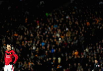 HULL, ENGLAND - DECEMBER 27:   Dimitar Berbatov of Manchester United looks on during the Barclays Premier League match between Hull City and Manchester United at KC Stadium on December 27, 2009 in Hull, England. (Photo by Jamie McDonald/Getty Images)