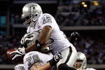 ARLINGTON, TX - NOVEMBER 26:  Wide receiver Darrius Heyward-Bey #12 of the Oakland Raiders celebrates a touchdown with Robert Gallery #76 against the Dallas Cowboys at Cowboys Stadium on November 26, 2009 in Arlington, Texas.  (Photo by Ronald Martinez/Getty Images)