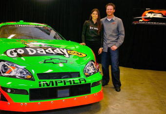 MOORESVILLE, NC - DECEMBER 17:  Danica Patrick (L), driver of the #7 GoDaddy.com Chevrolet poses with team owner Dale Earnhardt Jr. (R), at JR Motorsports on December 17, 2009 in Mooresville, North Carolina.  (Photo by Jason Smith/Getty Images)