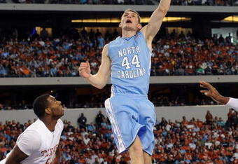 ARLINGTON, TX - DECEMBER 19:  Tyler Zeller #44 of the North Carolina Tar Heels takes a shot against the Texas Longhorns at Cowboys Stadium on December 19, 2009 in Arlington, Texas.  (Photo by Ronald Martinez/Getty Images)
