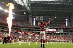 GLENDALE, AZ - NOVEMBER 01:  Linebacker Clark Haggans #53 of the Arizona Cardinals points to the sky as he is introduced before the NFL game against the Carolina Panthers at the Universtity of Phoenix Stadium on November 1, 2009 in Glendale, Arizona.  The Panthers defeated the Cardinals 34-21.  (Photo by Christian Petersen/Getty Images)