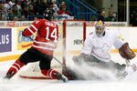 SASKATOON, SK - JANUARY 3:  Benjamin Conz #1 of Team Switzerland stops the puck on a shot by Jordan Eberle #14 of Team Canada during the 2010 IIHF World Junior Championship Tournament Semifinal game on January 3, 2010 at the Credit Union Centre in Saskatoon, Saskatchewan, Canada.  (Photo by Richard Wolowicz/Getty Images)