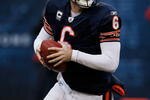 CHICAGO - DECEMBER 13: Jay Cutler #6 of the Chicago Bears looks for a receiver during a game against the Green Bay Packers at Soldier Field on December 13, 2009 in Chicago, Illinois. The Packers defeated the Bears 21-14. (Photo by Jonathan Daniel/Getty Images)