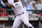 SEATTLE - SEPTEMBER 02:  Adrian Beltre #29 of the Seattle Mariners swings at the pitch against the Los Angeles Angels of Anaheim at Safeco Field on September 2, 2009 in Seattle, Washington. (Photo by Otto Greule Jr/Getty Images)