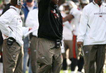 SEATTLE - DECEMBER 20:  Head Coach Raheem Morris of the Tampa Bay Buccaneers signals to his players during their game against the Seattle Seahawks on December 20, 2009 at Qwest Field in Seattle, Washington. The Buccaneers defeated the Seahawks 24-7. (Photo by Otto Greule Jr/Getty Images)