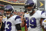 TAMPA, FL - JANUARY 1: Quarterback Mike Kafka #13 of the Northwestern Wildcats and defensive end Corey Wootton #99 at the coin toss against the Auburn Tigers in the Outback Bowl January 1, 2010 at Raymond James Stadium in Tampa, Florida.  (Photo by Al Messerschmidt/Getty Images) 