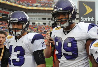 TAMPA, FL - JANUARY 1: Quarterback Mike Kafka #13 of the Northwestern Wildcats and defensive end Corey Wootton #99 at the coin toss against the Auburn Tigers in the Outback Bowl January 1, 2010 at Raymond James Stadium in Tampa, Florida.  (Photo by Al Messerschmidt/Getty Images) 