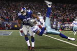 EAST RUTHERFORD, NJ - DECEMBER 06:  Mike Jenkins #21 of the Dallas Cowboys intercepts a pass in the endzone against Mario Manningham #82 of the New York Giants in the third quarter at Giants Stadium on December 6, 2009 in East Rutherford, New Jersey.  (Photo by Jim McIsaac/Getty Images)