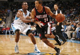 NEW ORLEANS - NOVEMBER 13:  Andre Miller #24 of the Portland Trail Blazers drives the ball against Chris Paul #3 of the New Orleans Hornets during the game at New Orleans Arena on November 13, 2009 in New Orleans, Louisiana.  NOTE TO USER: User expressly acknowledges and agrees that, by downloading and or using this photograph, User is consenting to the terms and conditions of the Getty Images License Agreement. (Photo by Chris Graythen/Getty Images)