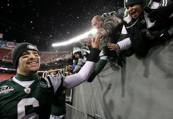 EAST RUTHERFORD, NJ - JANUARY 03:  Quarterback Mark Sanchez #6 of the New York Jets shakes hands with fans in celebration of their 37-0 victory over the Cincinnati Bengals at Giants Stadium on January 3, 2010 in East Rutherford, New Jersey. The game was the last regular season game to be played at Giants Stadium.  (Photo by Al Bello/Getty Images)