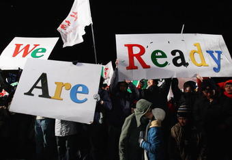 BEIJING - JANUARY 01:  Students hold up a sign saying 'We Are Ready', referring to the Summer Olympic Games, during a New Year's event on January 1, 2008 in Beijing, China. Celebrations highlighted Beijing's preparations as hosts of the 2008 Beijing Olympic Games.  (Photo by Feng Li/Getty Images)