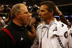 NEW ORLEANS - JANUARY 01:   Head coach Urban Meyer (R) of the Florida Gators talks with Interim head coach Jeff Quinn of the Cincinnati Bearcats after the Gators defeated the Bearcats 24-51 in the Allstate Sugar Bowl at the Louisana Superdome on January 1, 2010 in New Orleans, Louisiana.  (Photo by Matthew Stockman/Getty Images)