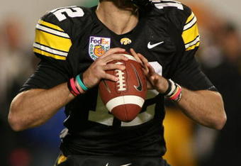 MIAMI GARDENS, FL - JANUARY 05:  Ricky Stanzi #12 of the Iowa Hawkeyes looks to pass against the Georgia Tech Yellow Jackets during the FedEx Orange Bowl at Land Shark Stadium on January 5, 2010 in Miami Gardens, Florida.  (Photo by Marc Serota/Getty Images)