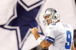 ARLINGTON, TX - JANUARY 03:  Quarterback Tony Romo #9 of the Dallas Cowboys celebrates a touchdown by Felix Jones against the Philadelphia Eagles at Cowboys Stadium on January 3, 2010 in Arlington, Texas.  (Photo by Ronald Martinez/Getty Images)