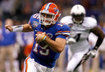 NEW ORLEANS - JANUARY 01:  Quarterback Tim Tebow #15 of the Florida Gators runs the ball against the Cincinnati Bearcats during the Allstate Sugar Bowl at the Louisana Superdome on January 1, 2010 in New Orleans, Louisiana.  (Photo by Matthew Stockman/Getty Images)