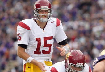SEATTLE - SEPTEMBER 19:  Quarterback Aaron Corp #15 of the USC Trojans gets ready for the hike during the game against the Washington Huskies on September 19, 2009 at Husky Stadium in Seattle, Washington. The Huskies defeated the Trojans 16-13. (Photo by Otto Greule Jr/Getty Images)