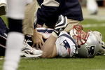 HOUSTON - JANUARY 03:  Wide receiver Wes Welker #83 of the New England Patriots is tended to by medical personnel after injuring his leg against the Houston Texans at Reliant Stadium on January 3, 2010 in Houston, Texas.  (Photo by Bob Levey/Getty Images)