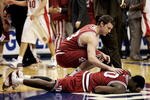 INDIANAPOLIS - MARCH 11:  Roderick Wilmont #10 of the Indiana Hoosiers is consoled by Sean Kline #23 after Wilmont missed a short jumper in the games finals seconds that just missed as the Hoosiers fell to the Ohio State Buckeyes 52-51 during Day 3 of the Big 10 Tournament on March 11, 2006 at Conseco Fieldhouse in Indianapolis, Indiana.  (Photo by Brian Bahr/Getty Images)