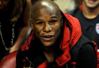 LAS VEGAS - OCTOBER 15:  Boxer Floyd Mayweather Jr. watches the preseason game between the Los Angeles Lakers and the Sacramento Kings at the Thomas & Mack Center October 15, 2009 in Las Vegas, Nevada. NOTE TO USER: User expressly acknowledges and agrees that, by downloading and/or using this Photograph, user is consenting to the terms and conditions of the Getty Images License Agreement.  (Photo by Ethan Miller/Getty Images)