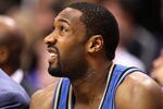 PHOENIX - DECEMBER 19:  Gilbert Arenas #0 of the Washington Wizards sits on the bench during the NBA game against the Phoenix Suns at US Airways Center on December 19, 2009 in Phoenix, Arizona. The Suns defeated the Wizards 121-95. NOTE TO USER: User expressly acknowledges and agrees that, by downloading and or using this photograph, User is consenting to the terms and conditions of the Getty Images License Agreement.  (Photo by Christian Petersen/Getty Images)