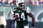 EAST RUTHERFORD, NJ - NOVEMBER 29:  Darrelle Revis #24 of the New York Jets runs the ball in for a first quarter touchdown after an interception against the Carolina Panthers on November 29, 2009 at Giants Stadium in East Rutherford, New Jersey.  (Photo by Jim McIsaac/Getty Images)