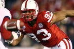 SAN DIEGO, CA - DECEMBER 30:  Defensive Tackle Ndamukong Suh #93 of the University of Nebraska Cornhuskers rushes the quarterback against the University of Arizona Wildcats during the Pacific Life Holiday Bowl, on December 30, 2009 at Qualcomm Stadium in San Diego, California. (Photo By Donald Miralle/Getty Images)