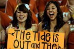 PASADENA, CA - JANUARY 07:  Fans cheer prior to the Citi BCS National Championship game between the Texas Longhorns and the Alabama Crimson Tide at the Rose Bowl on January 7, 2010 in Pasadena, California.  (Photo by Kevork Djansezian/Getty Images)