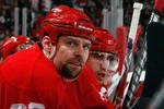 DETROIT - NOVEMBER 3:  Tomas Holmstrom #96 of the Detroit Red Wings looks on during the game against the Boston Bruins on November 3, 2009 at Joe Louis Arena in Detroit, Michigan. (Photo by Gregory Shamus/Getty Images)
