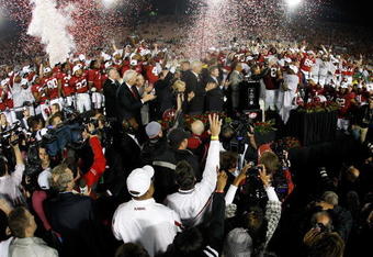 PASADENA, CA - JANUARY 07:  Head coach Nick Saban and the Alabama Crimson Tide celebrate with the BCS Championship trophy after winning the Citi BCS National Championship game over the Texas Longhorns at the Rose Bowl on January 7, 2010 in Pasadena, California. The Crimson Tide defeated the Longhorns 37-21.  (Photo by Harry How/Getty Images)
