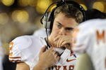 PASADENA, CA - JANUARY 07:  Quarterback Colt McCoy #12 of the Texas Longhorns looks on during the sideline in the fourth quarter against the Alabama Crimson Tide in the Citi BCS National Championship game at the Rose Bowl on January 7, 2010 in Pasadena, California.  McCoy left the game in the first quarter due to injury.  (Photo by Harry How/Getty Images)