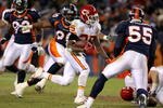 DENVER - JANUARY 03: Jamaal Charles #25 of the Kansas City Chiefs rushes through the defense of the Denver Broncos for a 56 yard fourth quarter touchdown during NFL action at Invesco Field at Mile High on January 3, 2010 in Denver, Colorado. (Photo by Doug Pensinger/Getty Images)