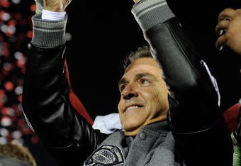 PASADENA, CA - JANUARY 07:  Head coach Nick Saban of the Alabama Crimson Tide celebrates with the BCS Championship trophy after winning the Citi BCS National Championship game over the Texas Longhorns at the Rose Bowl on January 7, 2010 in Pasadena, California. The Crimson Tide defeated the Longhorns 37-21.  (Photo by Kevork Djansezian/Getty Images)