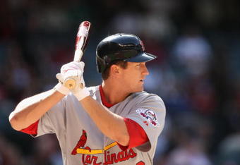 PHOENIX - APRIL 15:  David Freese #12 of the St. Louis Cardinals bats against the Arizona Diamondbacks during the game at Chase Field on April 15, 2009 in Phoenix, Arizona. The Cardinals defeated the Diamondbacks 12-7.  (Photo by Christian Petersen/Getty Images)