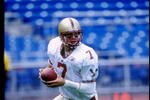 6 Sep 1997:  Quarterback Matt Hasslebeck of Boston University roles out to pass during the Eagles 28-21 loss to Temple University at Veterans Stadium in Philadelphia, Pennsylvania. Mandatory Credit: Tomasso DeRosa  /Allsport