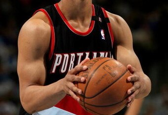DENVER - MARCH 05:  Jerryd Bayless #4 of the Portland Trail Blazers takes a free throw against the Denver Nuggets during NBA action at the Pepsi Center on March 5, 2009 in Denver, Colorado. The Nuggets defeated the Trail Blazers 106-90. NOTE TO USER: User expressly acknowledges and agrees that, by downloading and/or using this Photograph, user is consenting to the terms and conditions of the Getty Images License Agreement.  (Photo by Doug Pensinger/Getty Images)