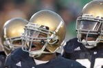 SOUTH BEND, IN - NOVEMBER 21: Brian Smith #58 of the Notre Dame Fighting Irish celebrates with teammates during the game against the Univeristy of Connecticut Huskies at Notre Dame Stadium on November 21, 2009 in South Bend, Indiana. Connecticut defeated Notre Dame 33-30 in overtime. (Photo by Jonathan Daniel/Getty Images)