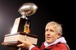 SAN FRANCISCO - DECEMBER 26: Head coach Pete Carroll of the USC Trojans celebrates after defeating the Boston College Eagles during the 2009 Emerald Bowl at AT&T Park on December 26, 2009 in San Francisco, California. (Photo by Jed Jacobsohn/Getty Images)