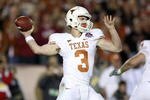 PASADENA, CA - JANUARY 07:  Quarterback Garrett Gilbert #3 of the Texas Longhorns attempts a pass against the Alabama Crimson Tide during the Citi BCS National Championship game at the Rose Bowl on January 7, 2010 in Pasadena, California.  (Photo by Stephen Dunn/Getty Images)