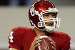 ARLINGTON, TX - SEPTEMBER 05:  Quarterback Sam Bradford #14 of the Oklahoma Sooners drops back to pass against the Brigham Young Cougars at Cowboys Stadium on September 5, 2009 in Arlington, Texas.  (Photo by Ronald Martinez/Getty Images)