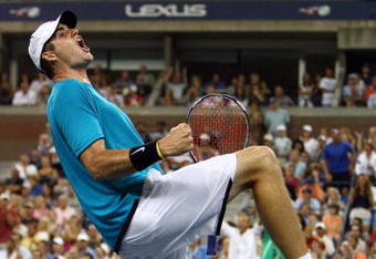 NEW YORK - SEPTEMBER 05:  John Isner celebrates after defeating Andy Roddick during day six of the 2009 U.S. Open at the USTA Billie Jean King National Tennis Center on September 5, 2009 in the Flushing neighborhood of the Queens borough of New York City.  (Photo by Al Bello/Getty Images)
