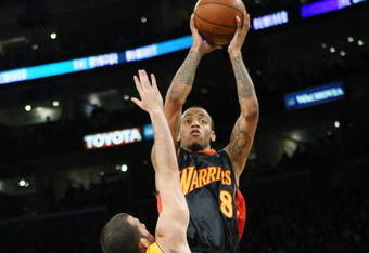 LOS ANGELES, CA - DECEMBER 29:  Monta Ellis #8 of the Golden State Warriors shoots over Jordan Farmar #1 of the Los Angeles Lakers on December 29, 2009 at Staples Center in Los Angeles, California.  The Lakers won 124-118. NOTE TO USER: User expressly acknowledges and agrees that, by downloading and/or using this Photograph, user is consenting to the terms and conditions of the Getty Images License Agreement.  (Photo by Stephen Dunn/Getty Images)