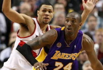 PORTLAND, OR - APRIL 08:  Kobe Bryant #24 of the Los Angeles Lakers battles for the ball with Brandon Roy #7 the Portland Trail Blazers at the Rose Garden on April 8, 2008 in Portland, Oregon.  NOTE TO USER: User expressly acknowledges and agrees that, by downloading and or using this Photograph, user is consenting to the terms and conditions of the Getty Images License Agreement.  (Photo by Jonathan Ferrey/Getty Images)  