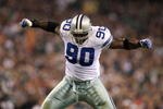 PHILADELPHIA - NOVEMBER 08:  Jay Ratliff #90 of the Dallas Cowboys reacts after he sacked Donovan McNabb #5 of the Philadelphia Eagles at Lincoln Financial Field on November 8, 2009 in Philadelphia, Pennsylvania. The Cowboys won 20-16. (Photo by Al Bello/Getty Images)