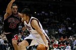 MILWAUKEE - NOVEMBER 30: Andrew Bogut #6 of the Milwuakee Bucks drives around Joakim Noah #13 of the Chicago Bulls at the Bradley Center on November 30, 2009 in Milwaukee, Wisconsin. The Bucks defeated the Bulls 99-97. NOTE TO USER: User expressly acknowledges and agrees that, by downloading and/or using this Photograph, User is consenting to the terms and conditions of the Getty Images License Agreement. (Photo by Jonathan Daniel/Getty Images)