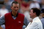12 Sep 1998:  Head coach Tommy Tuberville of the Mississippi Rebels talks to an unidentified man during a game against the Auburn Tigers at the Hemingway Stadium in Oxford, Mississippi. The Tigers defeated the Rebels 17-0. Mandatory Credit: Todd Warshaw